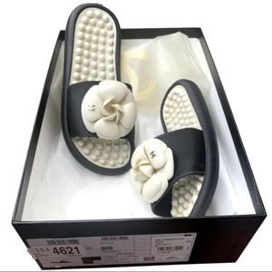 CHANEL Black/Ivory Camellia Rubber Slides